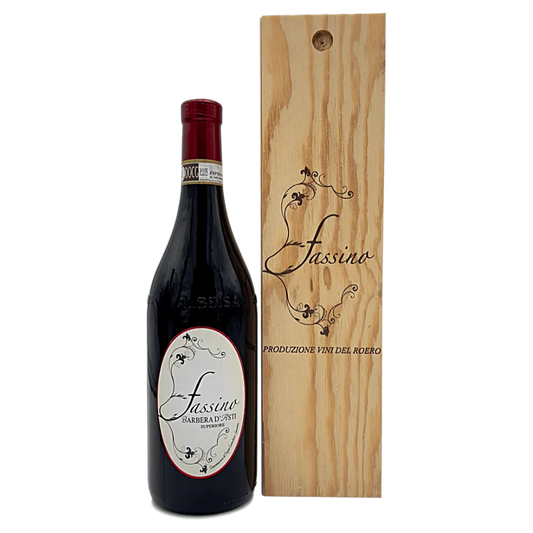 Barbera d'Asti Superiore D.O.C.G. Con astuccio in legno - Note tecniche: vitigno a bacca nera tipico piemontese, produce grappolo medio grandi con acini medio grandi. Produzione massima consentita 90 Q per ettaro,le uve provengono dai vigneti di propieta’ubicati nel comune diCISTERNA D’ASTI, é il vino che meglio esprime la personalità contadina piemontese: si presenta ruvido al primo impatto ma, per chi lo sa capire, dotato di grande cuore e generosità. Notevole corpo e struttura acida importante, colore r